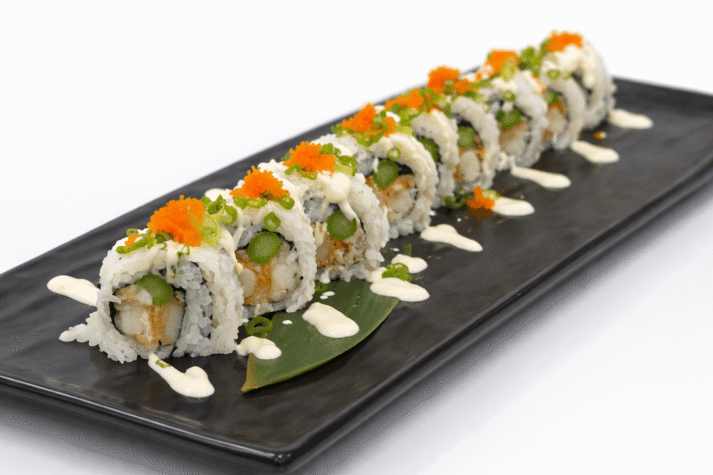 Assorted sushi platter with tuna, salmon, and avocado rolls